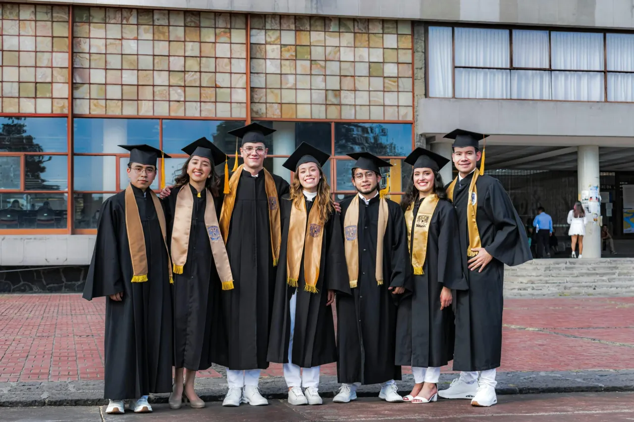 International graduates celebrating after admission to a Spanish university